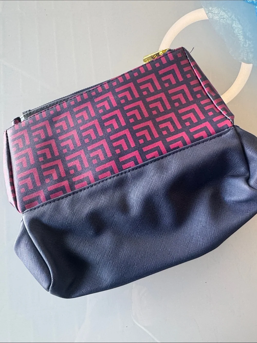 C. Wonder Pink Patterned & Navy Cosmetic Bag with Gold Accent